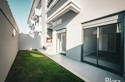 Apartamento garden com 2 dormitórios, suíte e jardim privativo, vaga com carregador elétrico