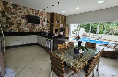 Casa com 4 dormitórios para alugar, 300 m² por R$ 15.094,83/mês - Residencial Real Park - Arujá/SP