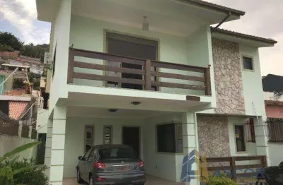 Casa com 4 quartos à venda na avenida governador jorge lacerda, --, costeira do pirajubaé, florianópolis por r$ 1.600.000