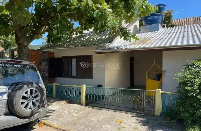 Investimento perfeito: duas casas em localização privilegiada em porto belo, próximo à praia e à praça central