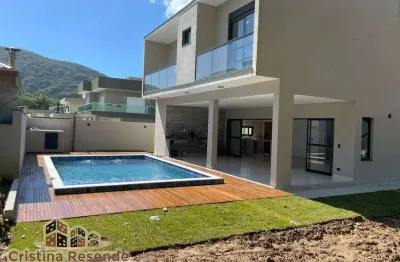 Casa em condomínio fechado com 4 quartos à venda na praia da lagoinha, ubatuba  por r$ 1.700.000