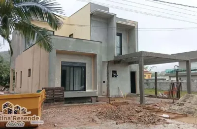 Casa em condomínio fechado com 4 quartos à venda na praia da lagoinha, ubatuba  por r$ 1.800.000