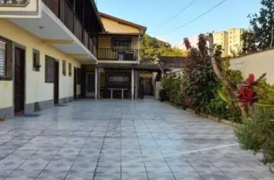Casa com 5 quartos à venda na rua joaquim aurélio nabuco de araújo, prainha, caraguatatuba, 300 m2 por r$ 960.000