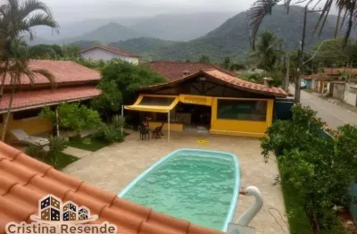 Casa com 4 quartos à venda no massaguaçu, caraguatatuba  por r$ 1.350.000