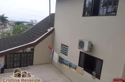 Casa com 4 quartos à venda no jardim califórnia, caraguatatuba  por r$ 720.000