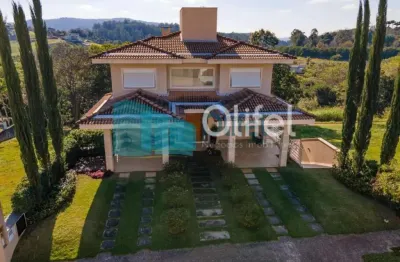 Sobrado com três andares, 05 quartos sendo 04 suítes, a master com closet, persiana automática, 2 chuveiros, banheira e varanda. cozinha, salas de jantar e estar com varanda e lareira. hall, jardim de