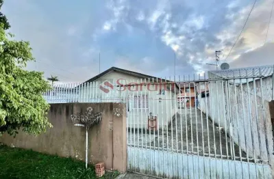 Vende-se terreno no cajuru com 3 casas- aceita permuta como parte do pagamento