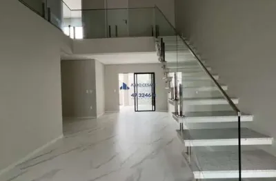 Sobrado de alto padrao   itajai   3 suites   2 vagas de garagem