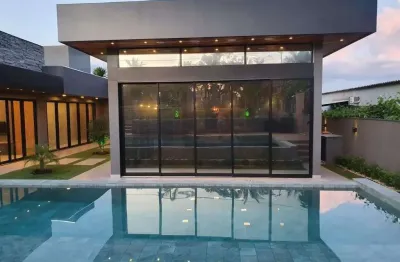 Belíssimo rancho em condomínio terras da barra com 4 suítes e 3 vagas de garagem !