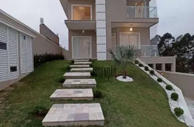 Casa com 3 dormitórios à venda, 329 m² por r$ 3.100.000,00 - residencial real park - arujá/sp