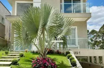 Casa com 3 dormitórios à venda, 329 m² por r$ 3.100.000,00 - residencial real park - arujá/sp