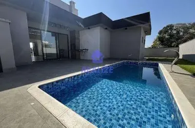 Casa com 3 dormitórios à venda, 220 m² por r$ 1.150.000,00 - condomínio ninho verde ii - pardinho/s