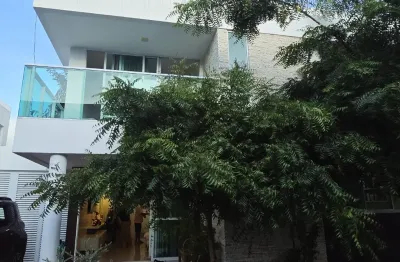 Casa em condomínio fechado foz do joanes com 4 suítes e fino acabamento
