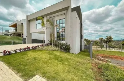 Casa em condomínio à venda no Alphaville Vespasiano com 4 suítes