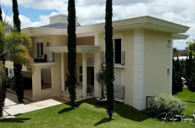 Sobrado mobiliado no aldeia do vale – estilo neoclássico, 5 suítes e lazer espetacular