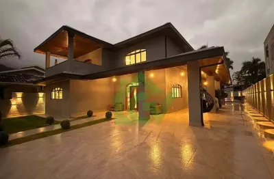 Casa com 6 dormitórios, 500 m² - venda por R$ 8.500.000,00 ou aluguel por R$ 32.800,00/mês - Condomínio Costa Verde Tabatinga - Caraguatatuba/SP
