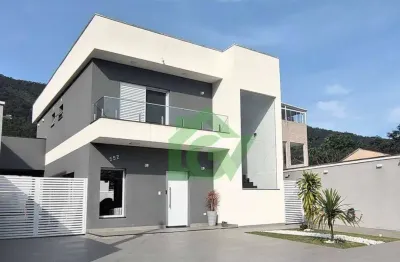 Casa com 3 dormitórios 3 suítes à venda, 230 m² por r$ 2.350.000 - massaguaçu - caraguatatuba/sp