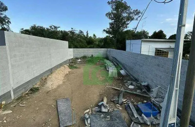 Terreno documentado à venda, 156 m² por R$ 120.000 - Balneário dos Golfinhos - Caraguatatuba/SP