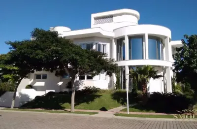 Casa com 4 quartos à venda na avenida dos dourados, jurerê internacional, florianópolis, 500 m2 por r$ 8.200.000