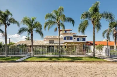 Casa em condomínio fechado com 5 quartos à venda na avenida dos coqueiros, daniela, florianópolis, 207 m2 por r$ 2.500.000