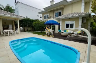 Casa em condomínio fechado com 4 quartos à venda na rua dos meros, jurerê internacional, florianópolis, 296 m2 por r$ 4.200.000