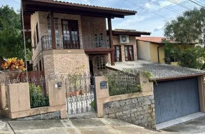 Casa em condomínio fechado com 4 quartos à venda na rua vereador frederico veras, pantanal, florianópolis, 360 m2 por r$ 1.800.000