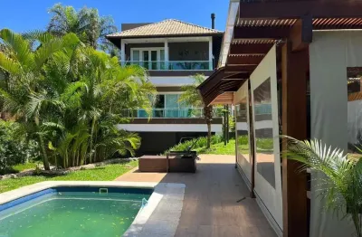 Casa em condomínio fechado com 4 quartos à venda na rodovia jornalista manoel de menezes, praia mole, florianópolis, 410 m2 por r$ 3.800.000