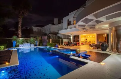 Casa em condomínio fechado com 5 quartos à venda na rua das trutas, jurerê internacional, florianópolis, 1100 m2 por r$ 21.980.000