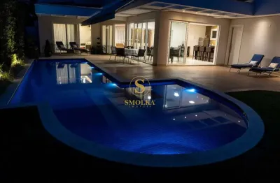 Casa em condomínio fechado com 4 quartos à venda na avenida dos dourados, jurerê internacional, florianópolis, 500 m2 por r$ 8.200.000