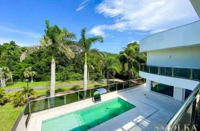 Casa em condomínio fechado com 5 quartos à venda na rua das caraúnas, jurerê internacional, florianópolis, 800 m2 por r$ 12.000.000