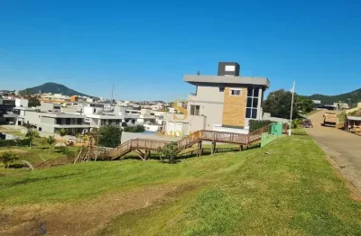 Terreno em condomínio fechado à venda na Rodovia Armando Calil Bulos, Ingleses do Rio Vermelho, Florianópolis, 509 m2 por R$ 990.000