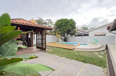 Casa em condomínio fechado com 4 quartos à venda na Rua das Piraúnas, Jurerê Internacional, Florianópolis, 185 m2 por R$ 3.890.000