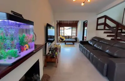 Casa em condomínio fechado com 4 quartos à venda na Rua das Piraúnas, Jurerê Internacional, Florianópolis, 185 m2 por R$ 3.890.000