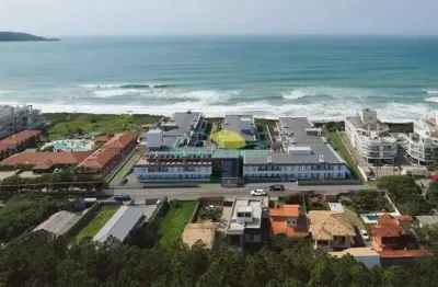 Apartamento de alto padrão com 3 suítes, no condomínio iconic home & resort, pé na areia, financiáv