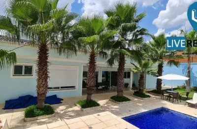 Casa térrea, alto padrão, 4 suítes e piscina no parque da fazenda