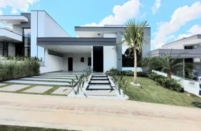 Linda e moderna casa à venda, com três suítes, linda piscina  com excelente acabamento, condomínio