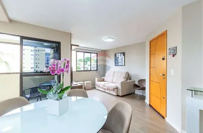 Apartamento no bairro Vila Izabel, dois quartos (1 suíte), cozinha integrada, sacada com churrasqueira e 2 vagas de garagem individuais e livres.