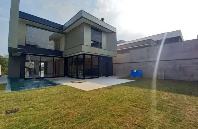 Casa com 3 dormitórios à venda, 330 m² por r$ 4.500.000,00 - condomínio reserva do itamaracá - valinhos/sp