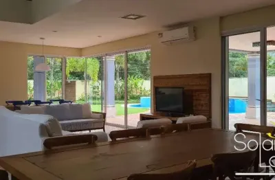 Bela casa - 5 suítes - 781 m² terreno - condomínio a poucos metros da praia