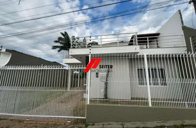 Casa a venda na agronômica, com 2 dormitorios sendo 1 suite, vaga de garagem coberta 139m²