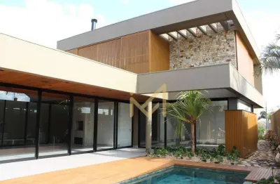 Sobrado com 4 suítes à venda, 471 m² por r$ 5.400.000 - condomínio residencial treviso - cascavel/pr