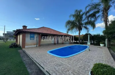 Chácara no condomínio village da serra em araçoiaba da serra/sp