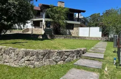 Casa em condomínio fechado com 4 quartos à venda na Rodovia Haroldo Soares Glavan, 1900, Cacupé, Florianópolis