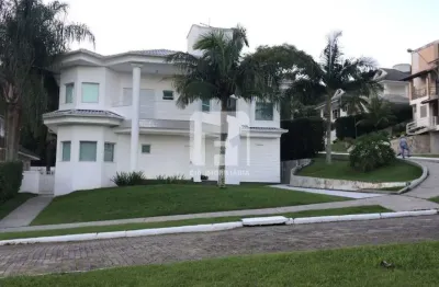 Casa em condomínio fechado com 4 quartos à venda na Rodovia Haroldo Soares Glavan, 929, Cacupé, Florianópolis