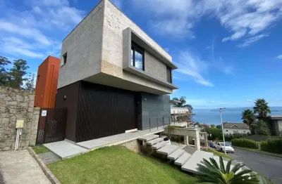 Casa em condomínio fechado com 3 quartos à venda na Rodovia Haroldo Soares Glavan, 4940, Cacupé, Florianópolis