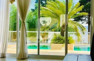 Casa em condomínio fechado com 6 quartos para alugar na Rodovia Haroldo Soares Glavan, 3450, Cacupé, Florianópolis