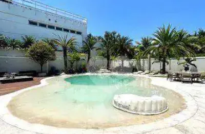 Condomínio malibu - casa cinematográfica de 4 suítes com piscina de prainha. barra da tijuca/rj.