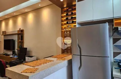 Meier vendo sala /loft com cozinha americana e banheiro com blindex.