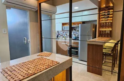 Meier vendo sala /loft com cozinha americana e banheiro com blindex.