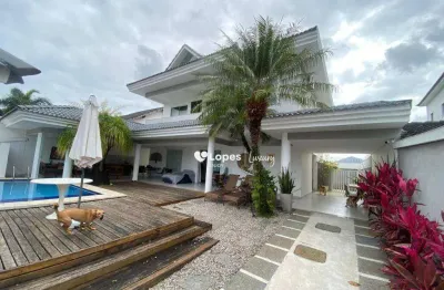 Maravilhosa casa com 4 quartos sendo 3 suítes em condomínio fechado em vargem pequena